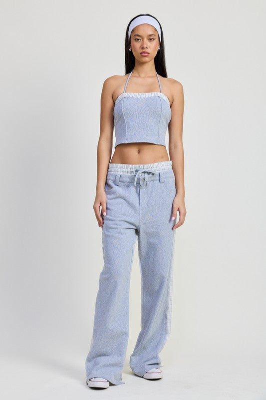 Emory Park Halter Neck Cropped Top in light blue worn with matching casual pants and headband