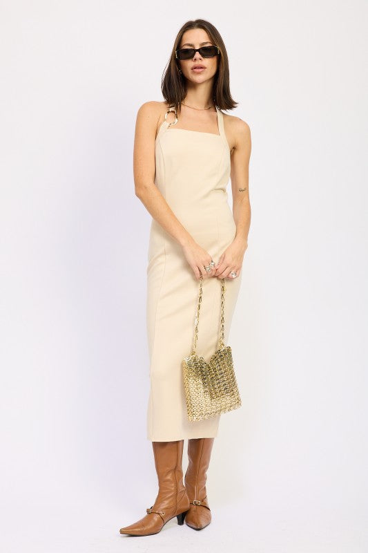 Emory Park Hardware Halter Midi Dress in beige, featuring a stylish silhouette and paired with chic accessories