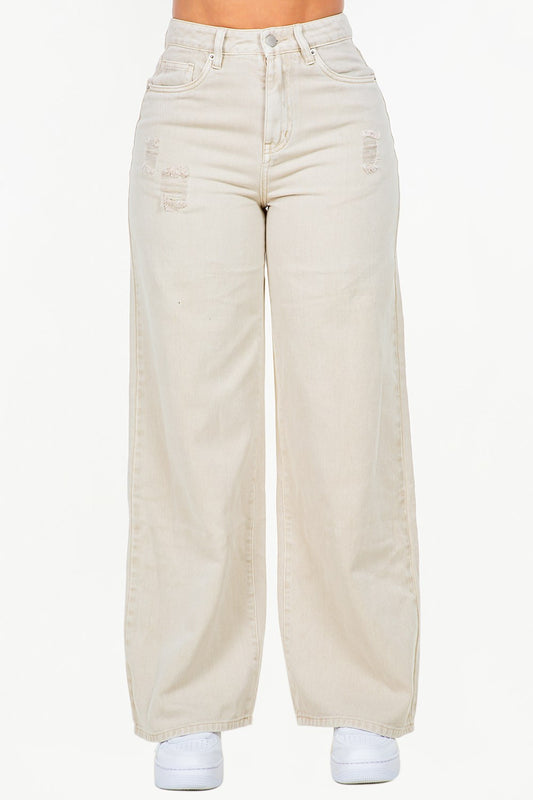 High waist wide leg jeans in light beige with distressed details for a trendy look
