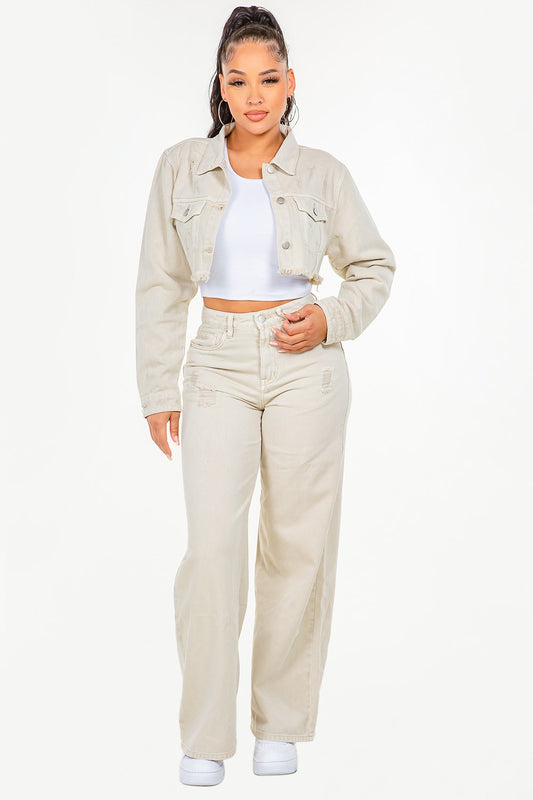 High waist wide leg jeans styled with a crop top and denim jacket for a trendy look