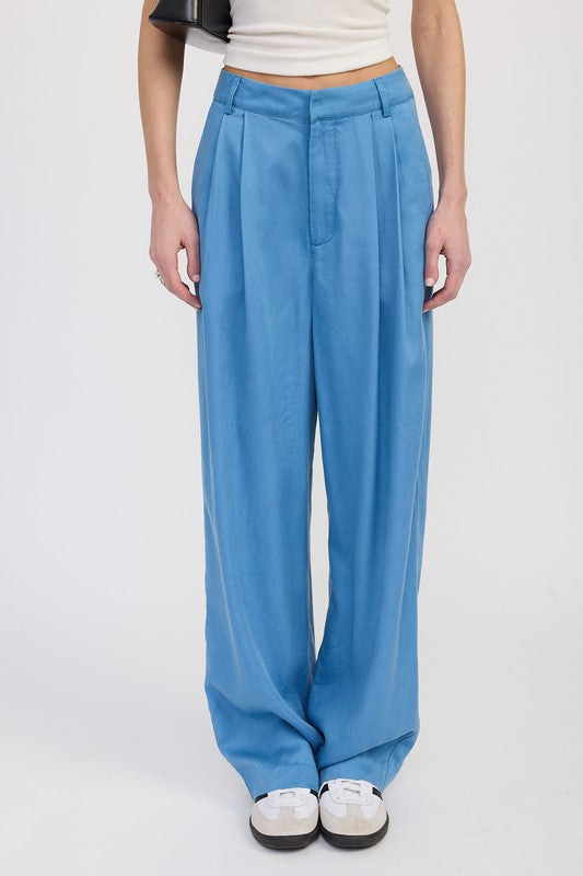 Emory Park High Waist Wide Leg Trousers With Front Pleats in blue styled with white top and sneakers