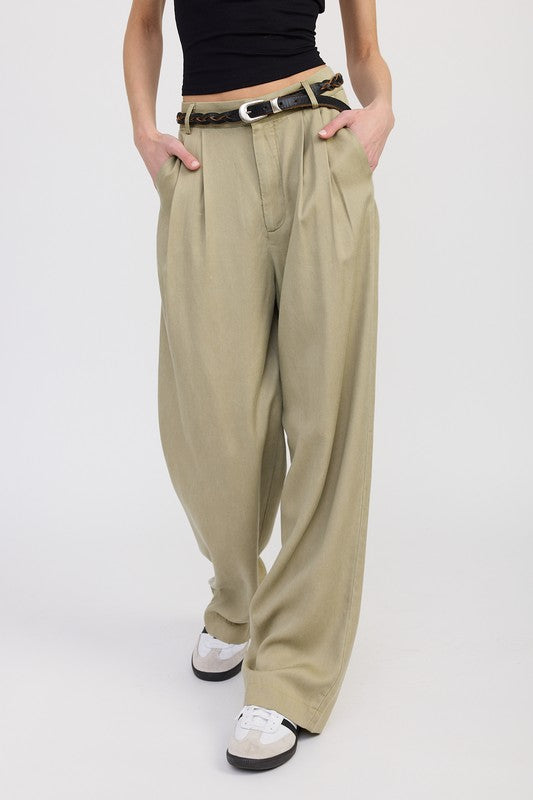 Emory Park High Waist Wide Leg Trousers With Front Pleats in beige styled with black belt and white sneakers