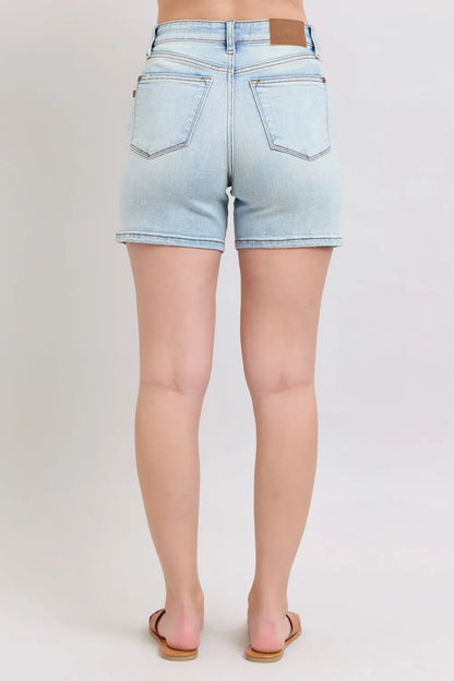 Judy Blue 2 Button Denim Shorts with Pockets in a light wash, featuring a stylish back view