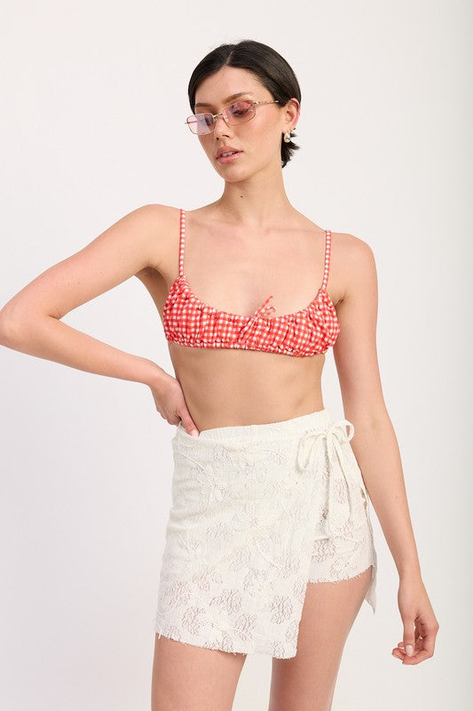Emory Park Lace Wrap Skirt With Drawstring in white lace worn with red check crop top and sunglasses