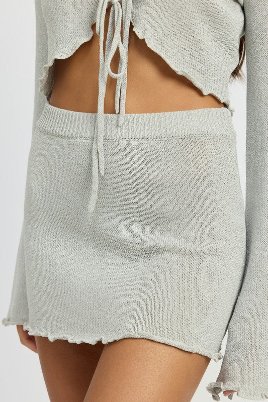 Emory Park Lettuce Hem Crochet Mini Skirt in light gray knit fabric with scalloped edges