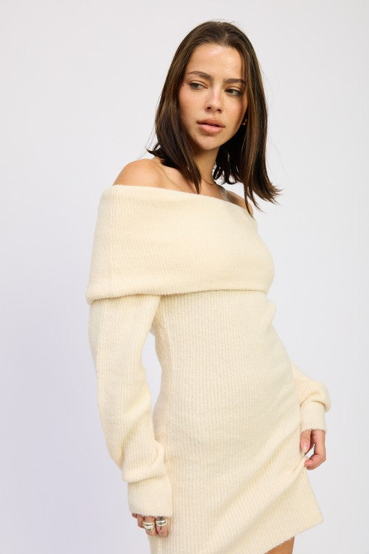 Emory Park model wearing Long Sleeve Off-Shoulder Mini Knit Dress in cream with folded neckline and fitted silhouette