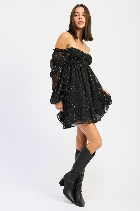 Emory Park Long Sleeve Smocked Baby Doll Mini Dress in black with a flowy design and dotted pattern