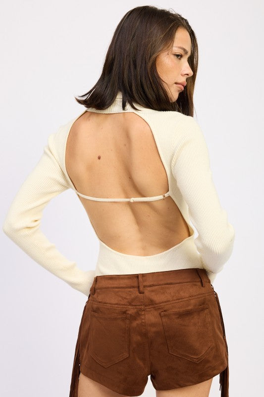Emory Park Long Sleeve Turtle Neck Bodysuit in cream with an open back design and fitted silhouette