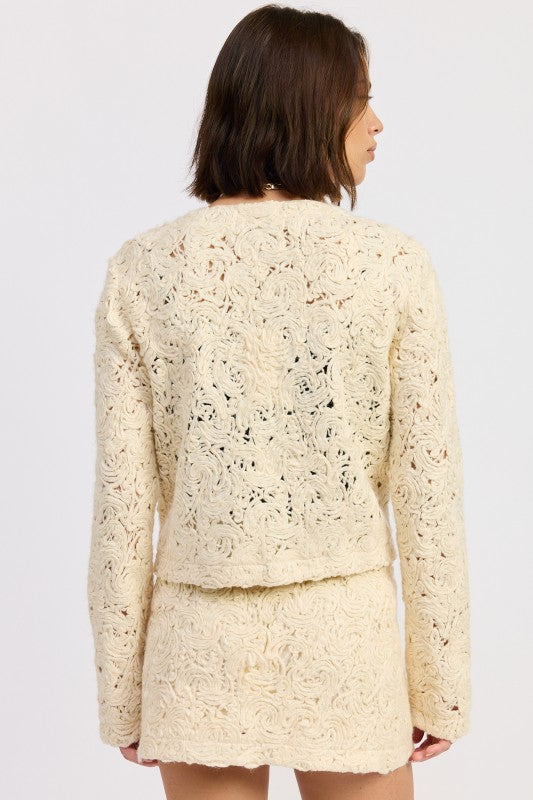 Emory Park Macrame Cropped Jacket in cream with intricate floral knit design and long sleeves