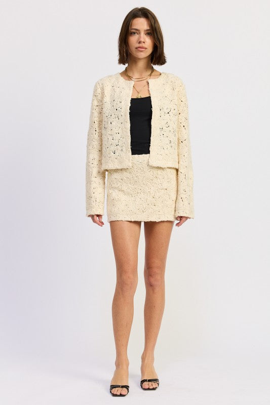 Emory Park Macrame Mini Skirt paired with a matching cropped sweater for a stylish summer look
