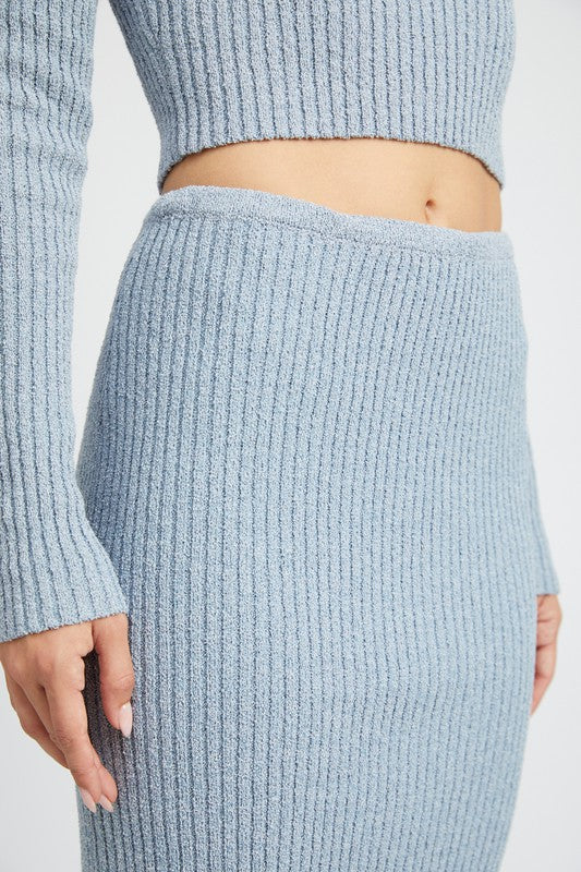 Emory Park light blue Maxi Knit Skirt With Back Slit in ribbed texture shown from waist to mid-thigh