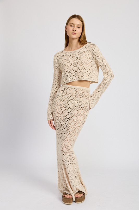 Emory Park Mermaid Maxi Crochet Skirt in beige worn with matching long sleeve crop top