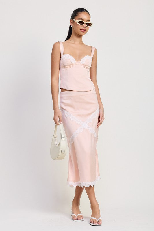 Emory Park midi satin skirt with lace detail in soft pink worn with matching top and white sandals