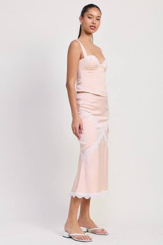 Emory Park Midi Satin Skirt With Lace Detail in soft pink worn with matching top and white sandals