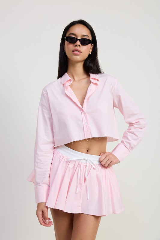 Emory Park Mini Contrast Waistband Skirt in light pink with white waistband worn with matching cropped shirt