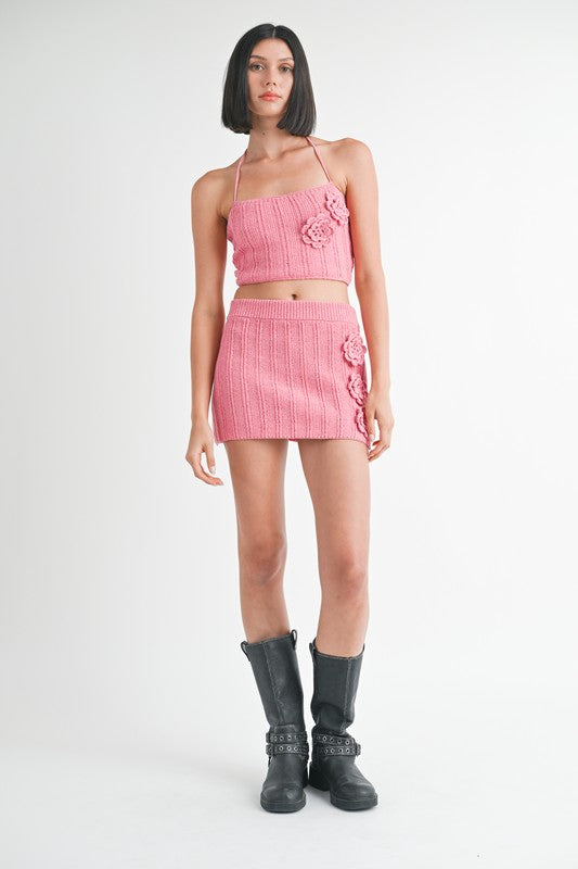 Emory Park pink Mini Crochet Skirt with floral details styled with matching crop top and black boots