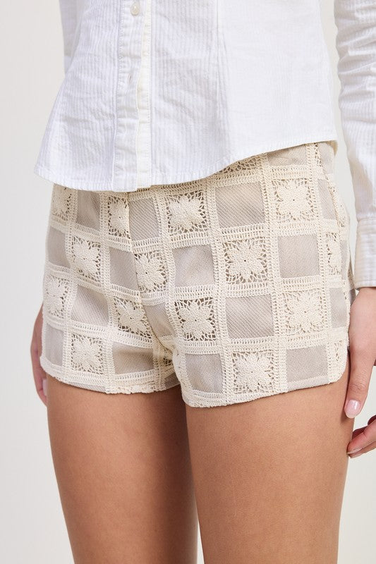 Emory Park Mini Jacquard Crochet Shorts in beige with square crochet pattern and comfortable fit
