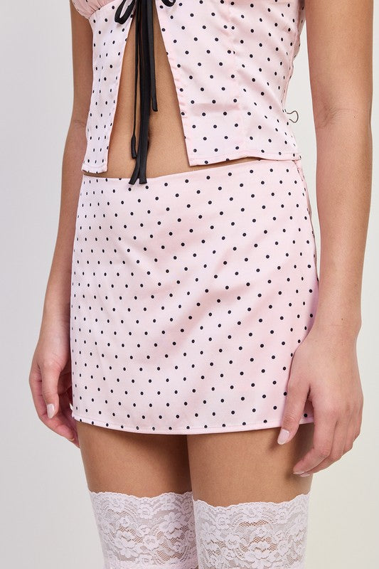 Emory Park Mini Polka Dot Skort in light pink with black dots paired with matching top and lace thigh-high stockings