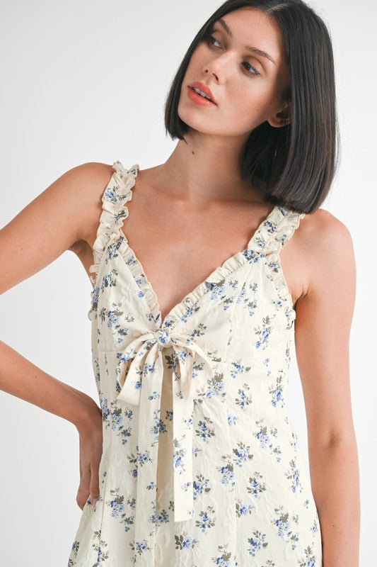 Emory Park Mini Ruffle Bow Tie Dress in cream with blue floral print and ruffled straps