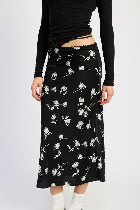 Emory Park Mixe Media Asymmetrical Maxi Satin Skirt with white rose print on black fabric