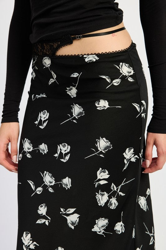 Emory Park Mixe Media Asymmetrical Maxi Satin Skirt in black with white rose print and scalloped waistband