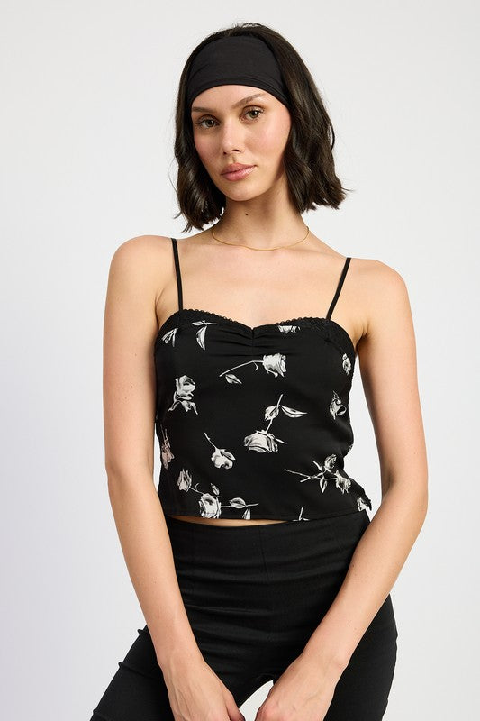 Emory Park Mixed Media Satin Spaghetti Strap Top in black with white floral print worn by model