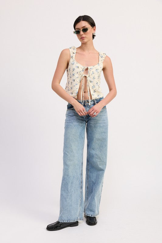 Emory Park Tie Front Peasant Top in floral print worn with light blue jeans and sunglasses