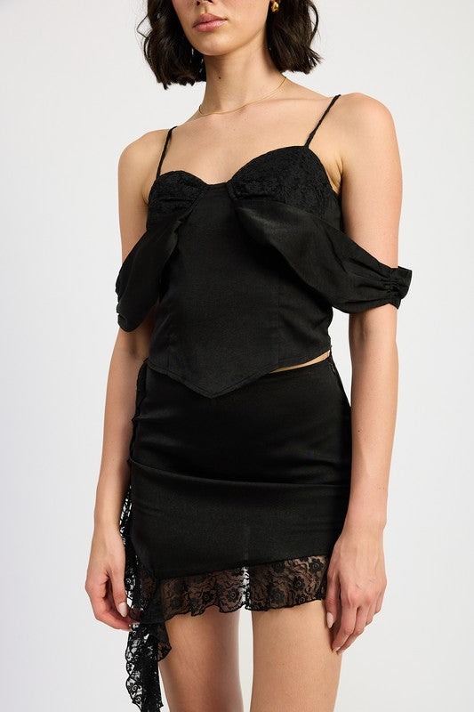 Off Shoulder Satin Bustier With Lace Detail by Emory Park in black worn with matching lace skirt