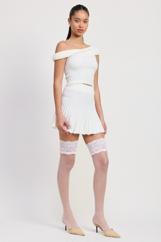 Emory Park Off The Shoulder Knit Top in white worn with matching pleated skirt and beige heels