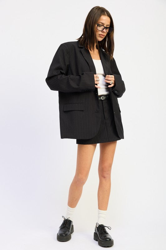 Emory Park Pinstripe Oversize Blazer styled with a fitted top and mini skirt for a chic look