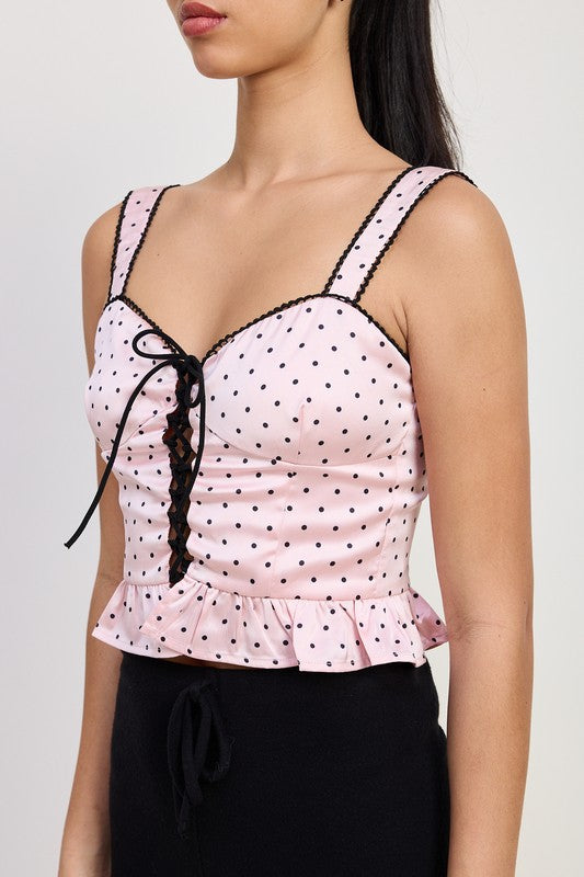 Emory Park pink Polka Dot Corset Top with black lace-up front and ruffle hem detail