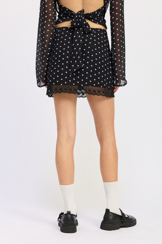 Back view of Emory Park Polka Dot Mini Lace Skirt with scalloped lace trim and stylish design