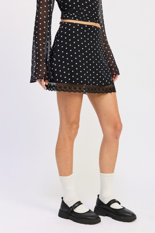 Emory Park Polka Dot Mini Lace Skirt in black with a trendy lace hem for stylish summer wear