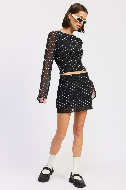 Emory Park Polka Dot Mini Lace Skirt paired with a matching top for a trendy outfit