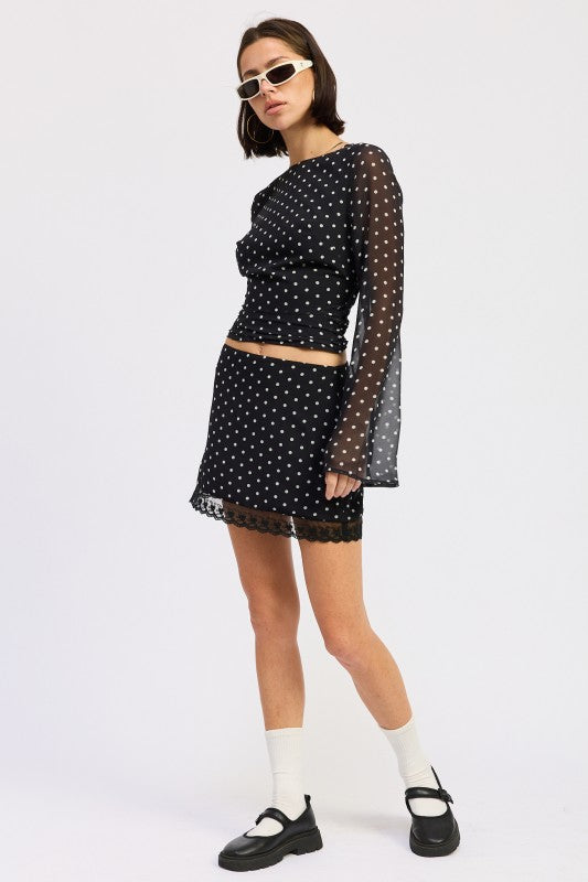 Emory Park Polka Dot Mini Lace Skirt styled with a matching top for a chic look