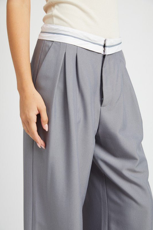 Emory Park Reverse Waist Band Tailored Pants in gray with pleated front and white waistband detail