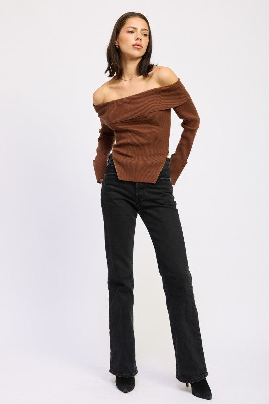 Emory Park model wearing Ribbed Off-Shoulder Sweater With Zipper in brown paired with black jeans