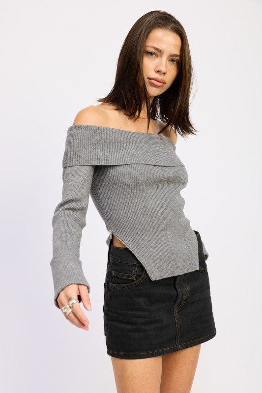 Emory Park model wearing gray Ribbed Off-Shoulder Sweater With Zipper paired with black denim mini skirt