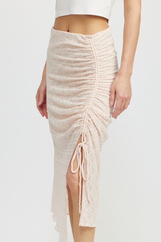 Emory Park Ruched Lace Skirt With High Slit in light beige textured fabric styled with a cropped white top