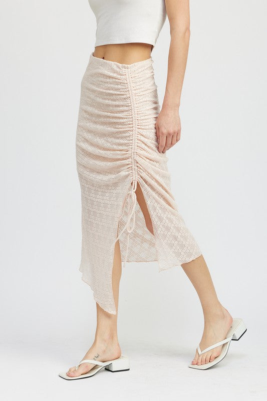 Emory Park Ruched Lace Skirt With High Slit in light pink styled with white crop top and sandals