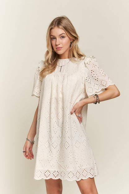 Ruffled Eyelet Dress in Cream with Puff Sleeves and Scalloped Hem for Summer Fashion
