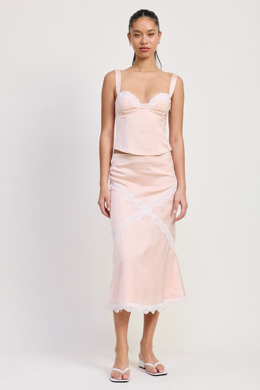 Emory Park Satin Bustier Top With Lace Detail in soft pink worn with matching skirt and white sandals
