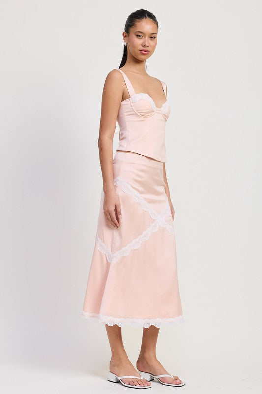 Emory Park Satin Bustier Top With Lace Detail in soft pink worn with matching skirt