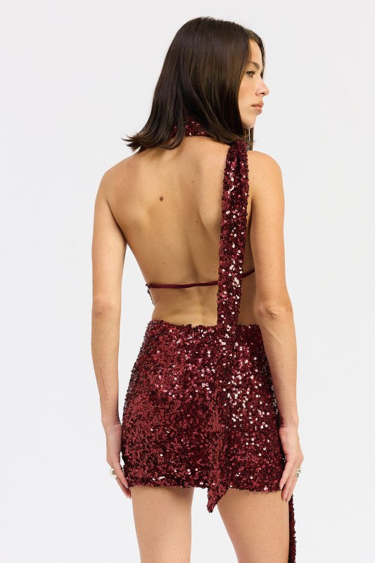Emory Park Seqin Halter Scarf Mini Dress in burgundy featuring a backless design and sparkling sequins
