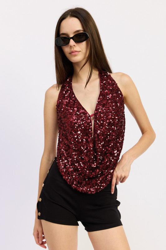 Emory Park Sequin Cowl Drape Halter Top in burgundy paired with stylish black shorts