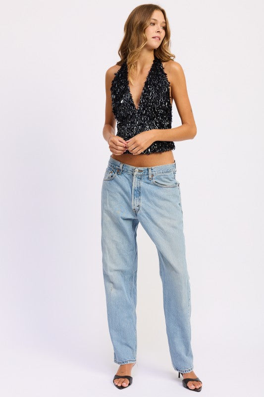 Emory Park Sequin Pailette Halter Top in black paired with light wash jeans for a chic look