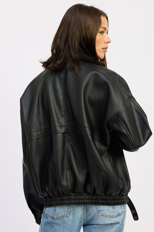 Back view of Emory Park Shearling Collar Vegan Leather Jacket with a relaxed fit and elastic hem