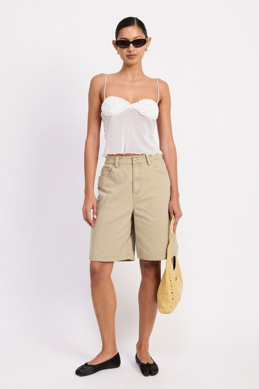 Emory Park model wearing Sheer Mesh Floral Cup Cami Top in white with khaki bermuda shorts black flats