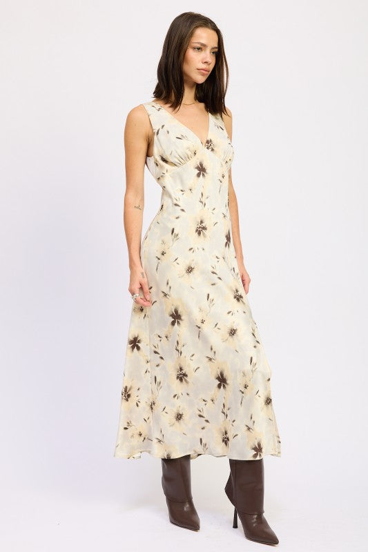 Emory Park V-Neck Floral Midi Bias Dress worn by model sleeveless cream floral midi with brown boots