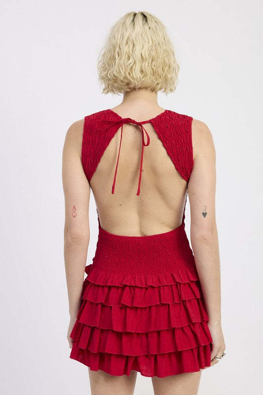 Back view of Emory Park sleeveless smocked mini dress with ruffle in vibrant red color